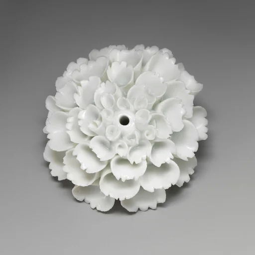 Porcelain flower (one of a set of nine)