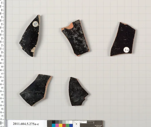 Terracotta fragments of kylikes (drinking cups)