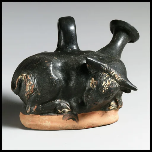 Terracotta askos (flask  with a spout and handle over the top)