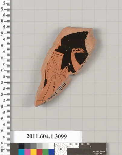 Terracotta fragment of a kylix (drinking cup)