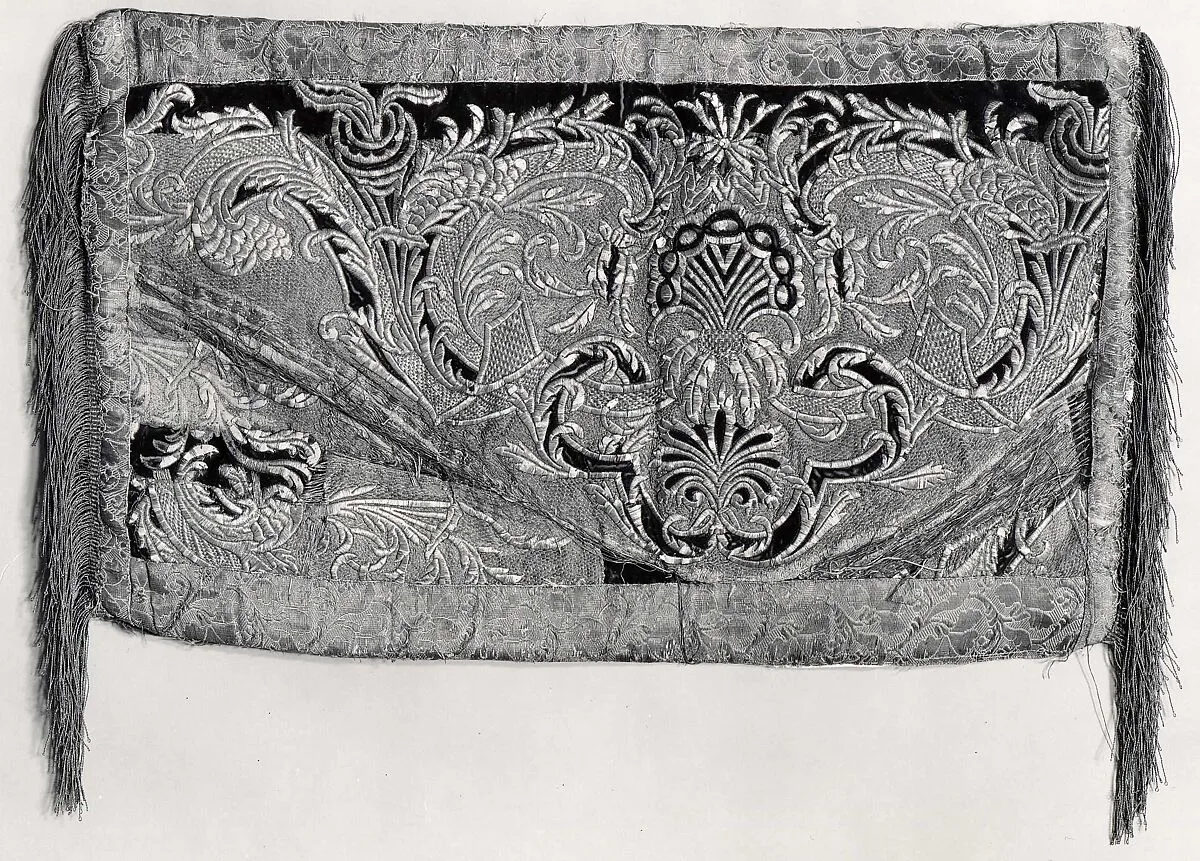 Part of a cope (?) made into a cushion — Unknown