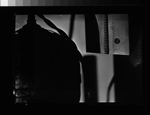 [Back of Studio Light and Wooden Object]