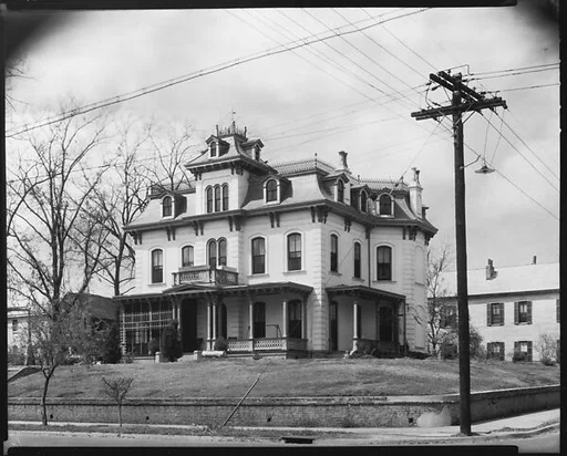[Second Empire House on Corner with Telephone Pole and Lines, Natchez, Mississippi]
