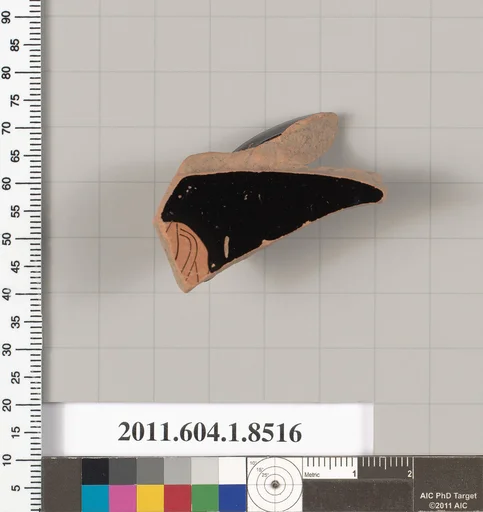 Terracotta fragment of a stemless kylix (drinking cup)