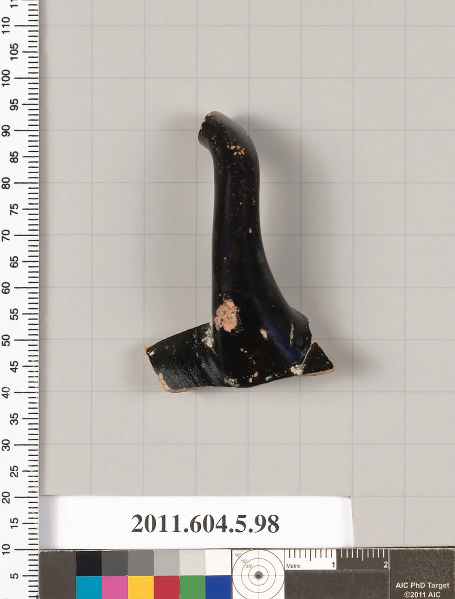 Terracotta fragment of a stemless kylix (drinking cup)? — Unknown