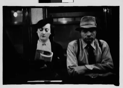 [Five 35mm Film Frames: Subway Passengers, New York City: Woman Reading, Man in Hat and Shirt Sleeves, Woman with Hands to Face and Newspaper on Lap, Older Woman, Man Leaning in Doorway, Older Woman Seated Next to Man in Cap]