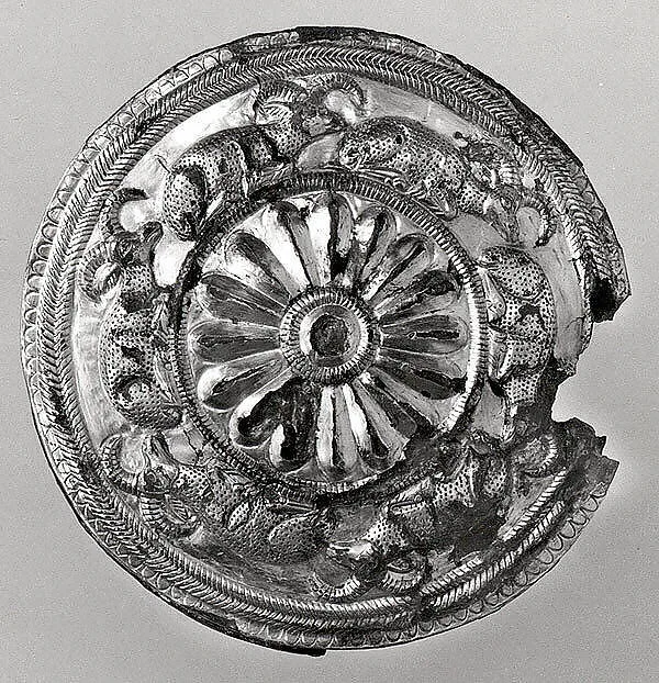 Roundel with a rosette and recumbent horned animals — Unknown