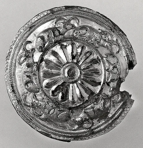 Roundel with a rosette and recumbent horned animals