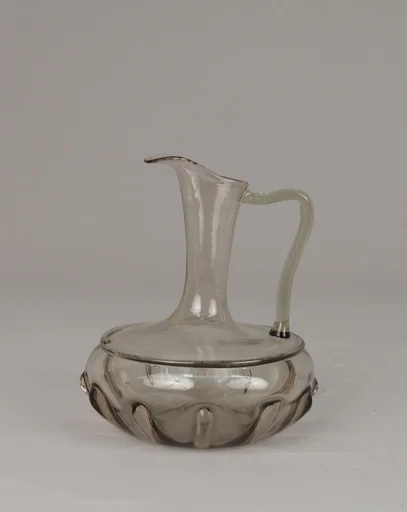 Partially-ribbed, amber-toned cruet bottle