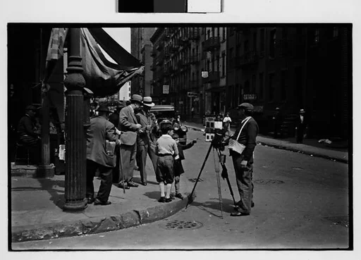 [Two 35mm Film Frames: Tintype Photographer and Group on Street Corner, New York City]