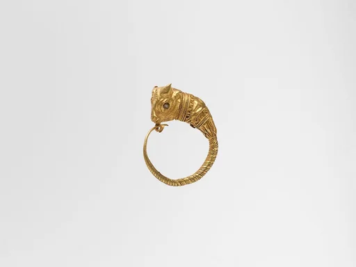Gold earrings with bull's head