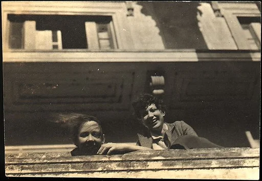 [Jane Ninas and Christine Fairchild on Balcony, Belle Grove Plantation House, White Castle, Louisiana]