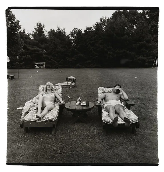 A family on their lawn one Sunday in Westchester, N.Y. — Diane Arbus