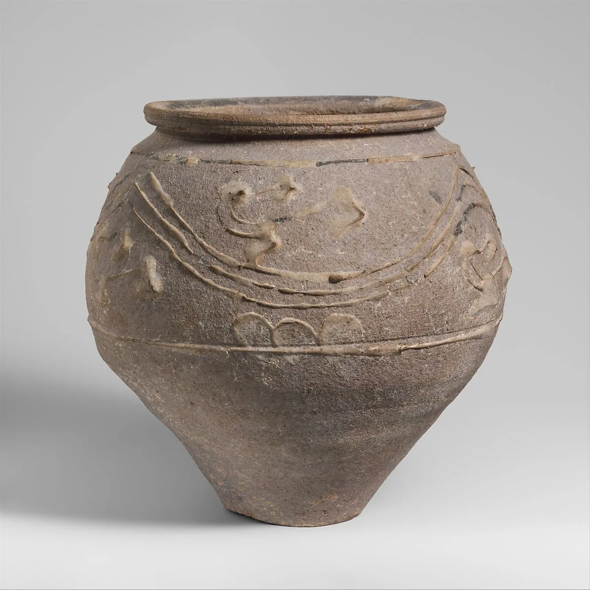 Terracotta jar with barbotine decoration — Unknown