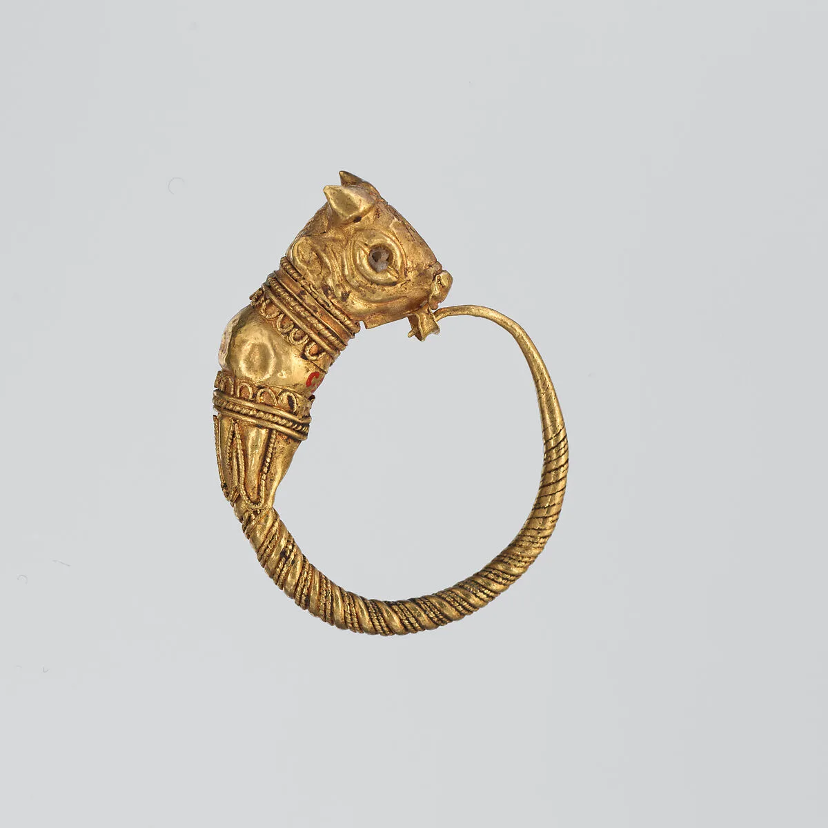 Gold earring with head of a bull — Unknown