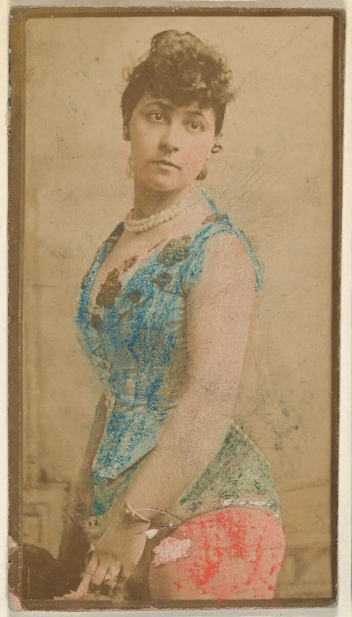 Actress wearing hand-colored blue bodice, from the Actresses series (N668) — Unknown