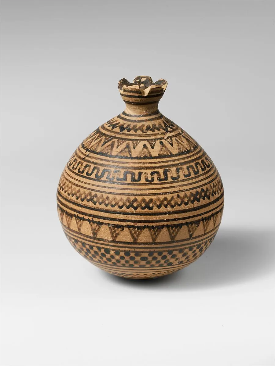 Terracotta vase in the form of a pomegranate — Unknown