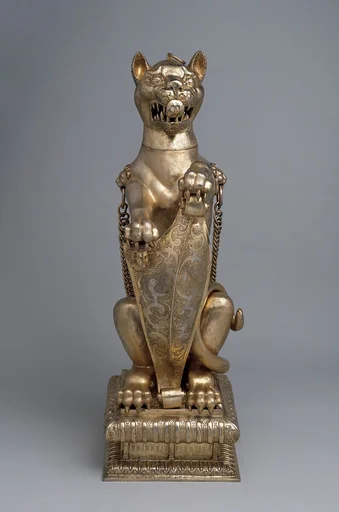 Leopard holding a shield