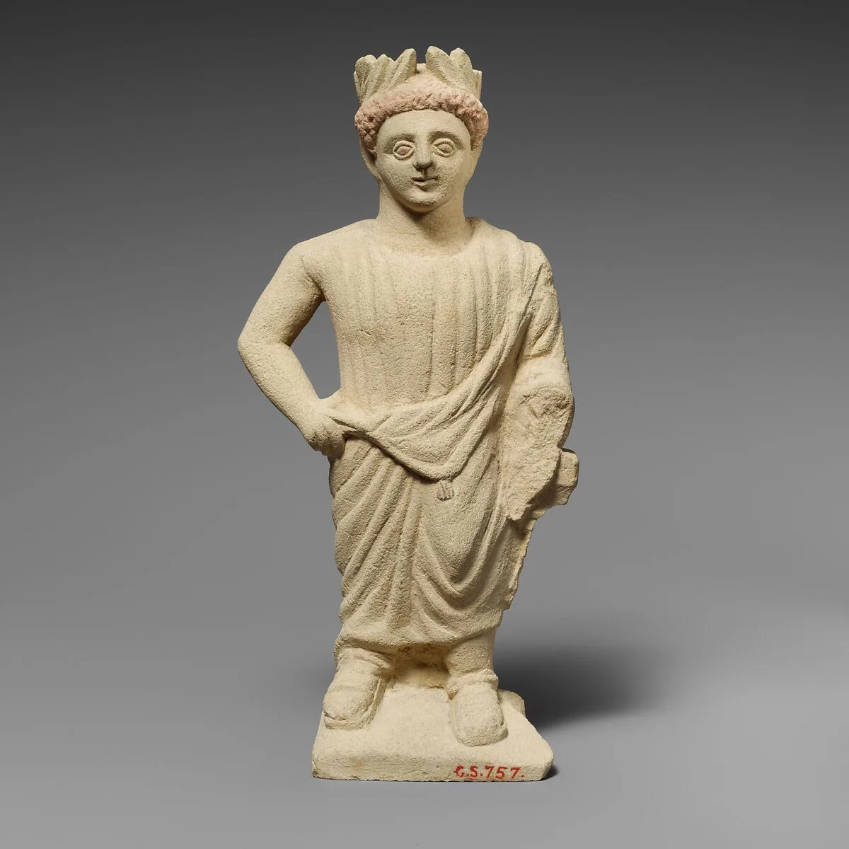 Limestone statuette of a beardless male votary with a wreath of leaves — Unknown