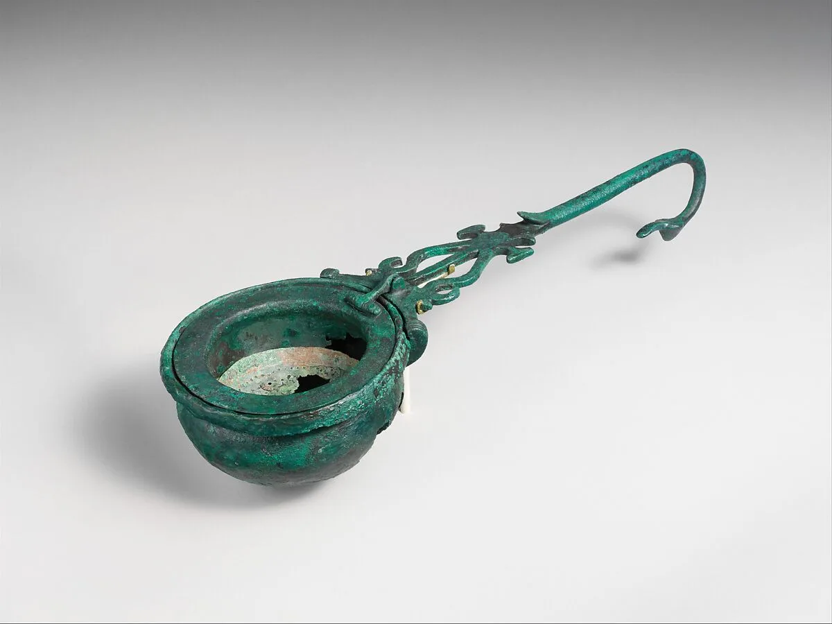 Bronze funnel-strainer — Unknown