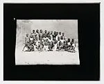 Thirty-one girls and a Koranic master (?) — Unknown