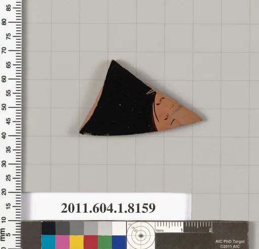 Terracotta fragment of a kylix (drinking cup)
