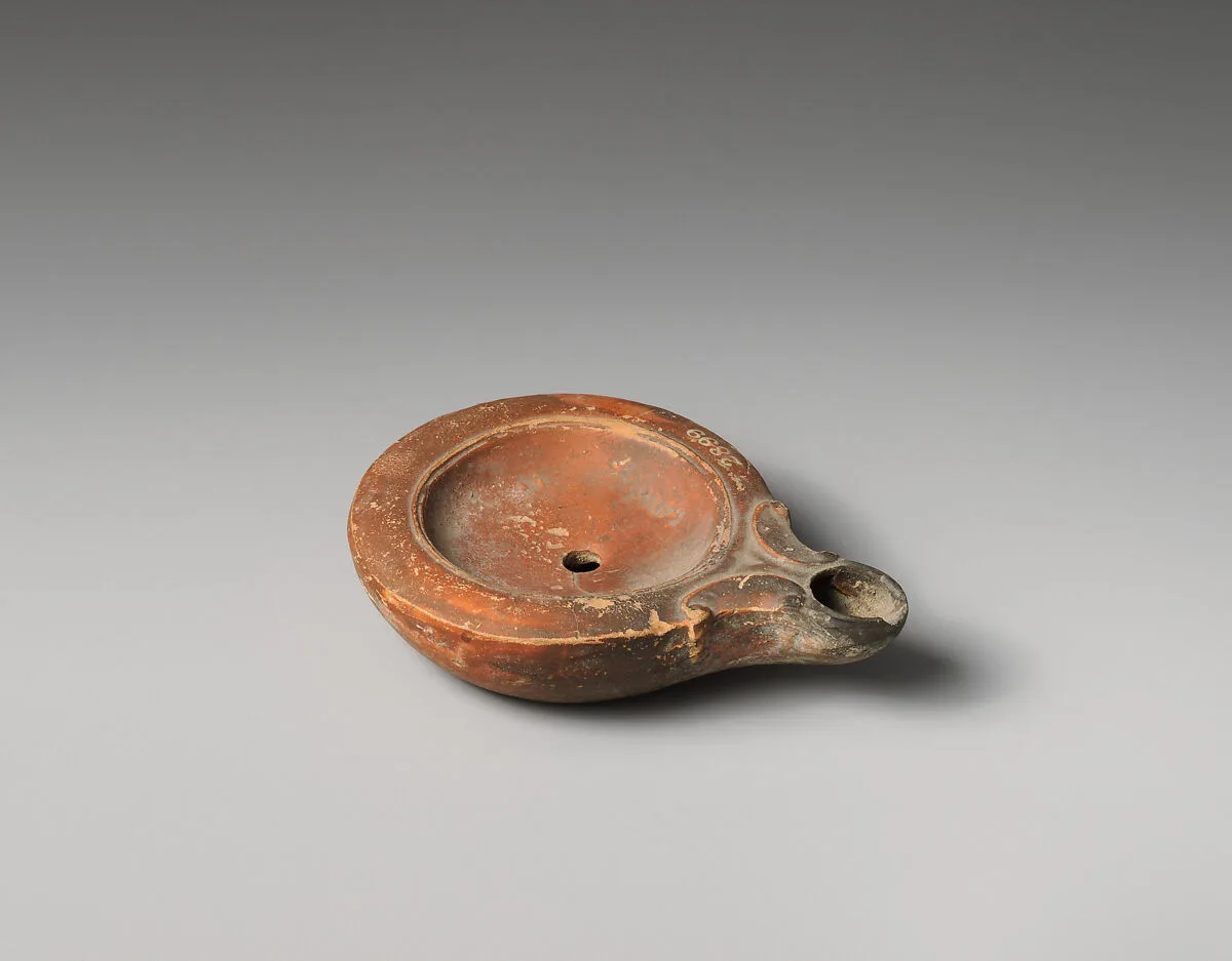 Terracotta oil lamp — Unknown