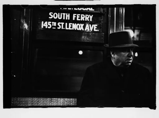 [Two 35mm Film Frames: Subway Passengers, New York City: Man in Hat and Overcoat Beneath "South Ferry" Sign, Two Women]