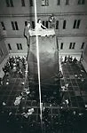 [William Mahin, Lette Eisenhauer, and Charles Simon Atop Giant "Mountain" Construction in "The Courtyard," A Happening by Allan Kaprow, New York City]