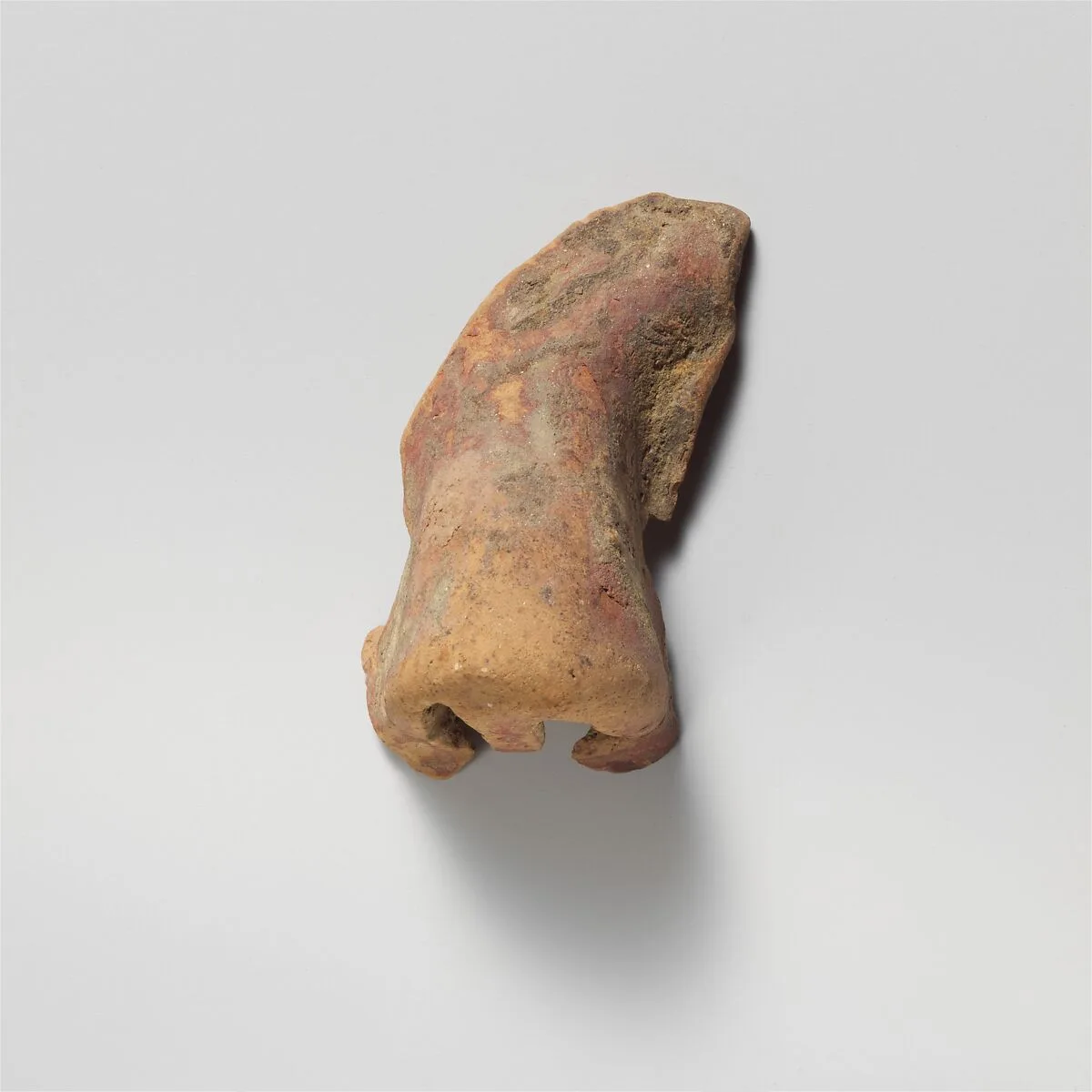 Nose from a terracotta mask — Unknown