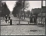 [East Berlin Women Waving to their West Berlin Friends Across the Barbed-Wire Barricade, Which Later Became the Berlin Wall]