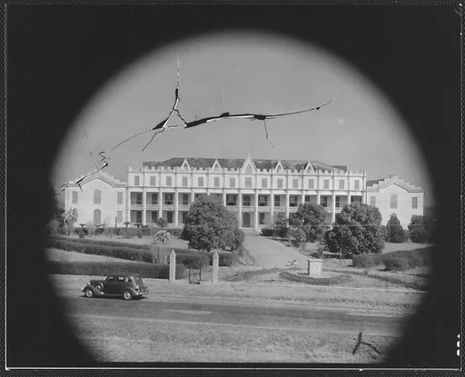 [Large Gothic Revival Building with Parked Car in Front, Convent Vicinity, Louisiana]