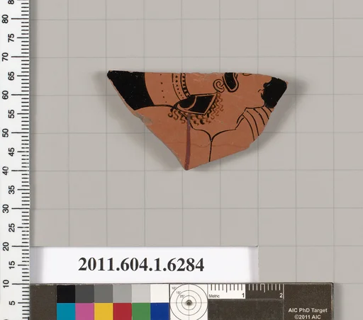 Terracotta fragment of a kylix (drinking cup)