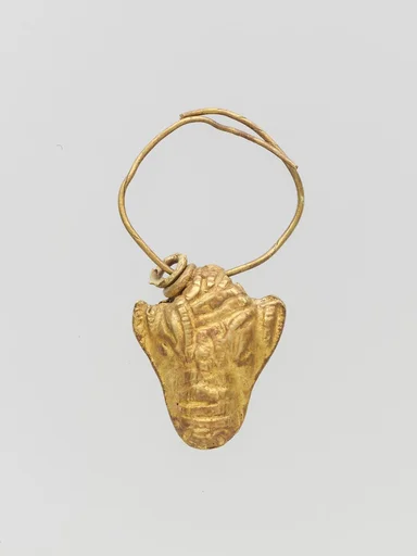 Gold pendant in the form of a bull's head