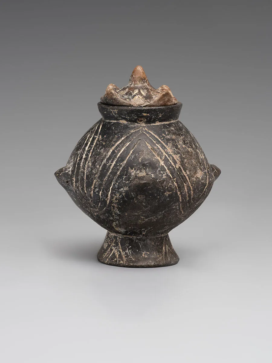 Vessel with a lid and incised decoration — Unknown