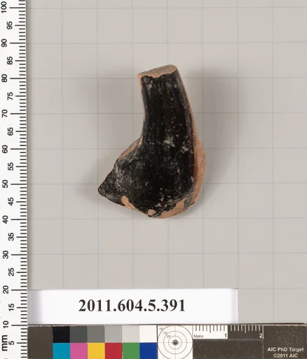 Terracotta fragment of a kylix (drinking cup)