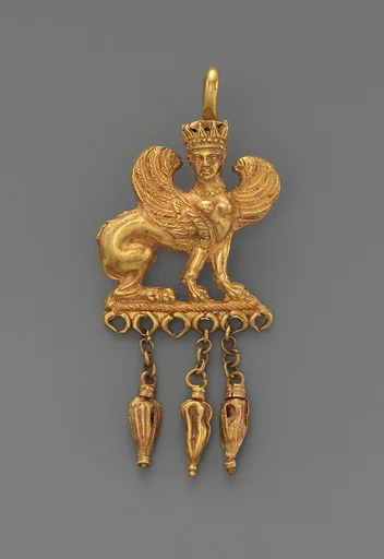 Gold earring with a sphinx