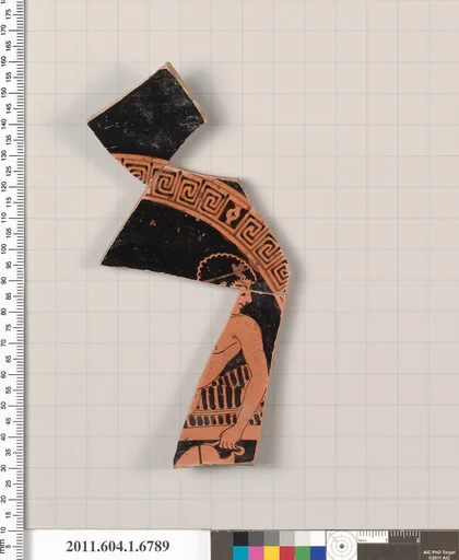 Terracotta fragment of a kylix (drinking cup)