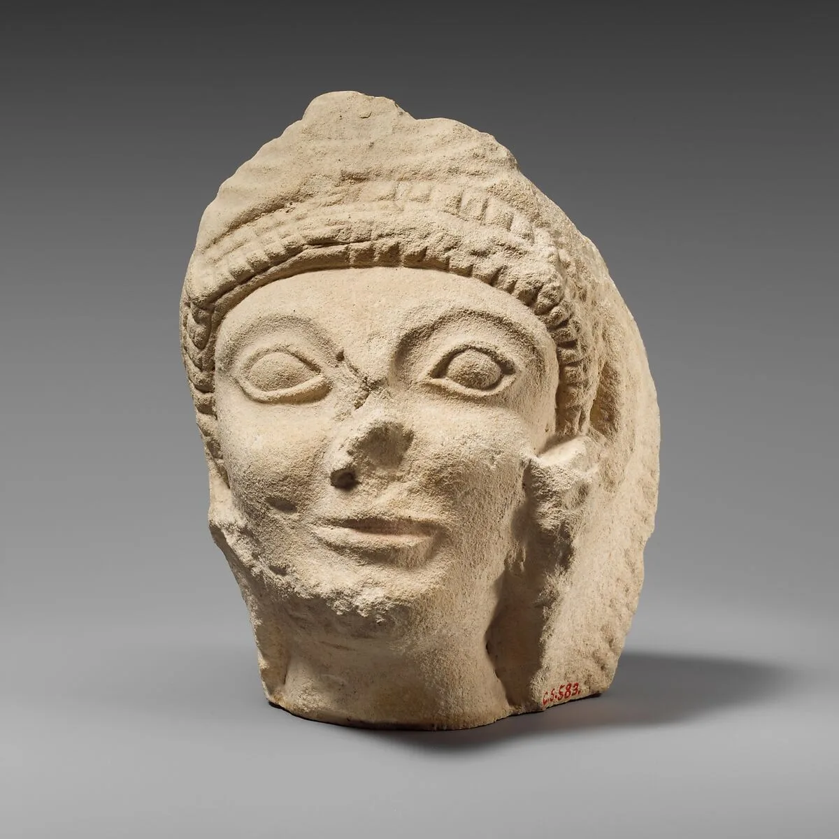 Limestone head of Herakles wearing the lion skin — Unknown