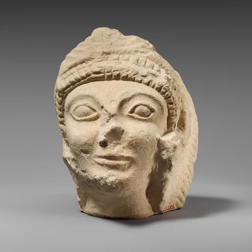 Limestone head of Herakles wearing the lion skin