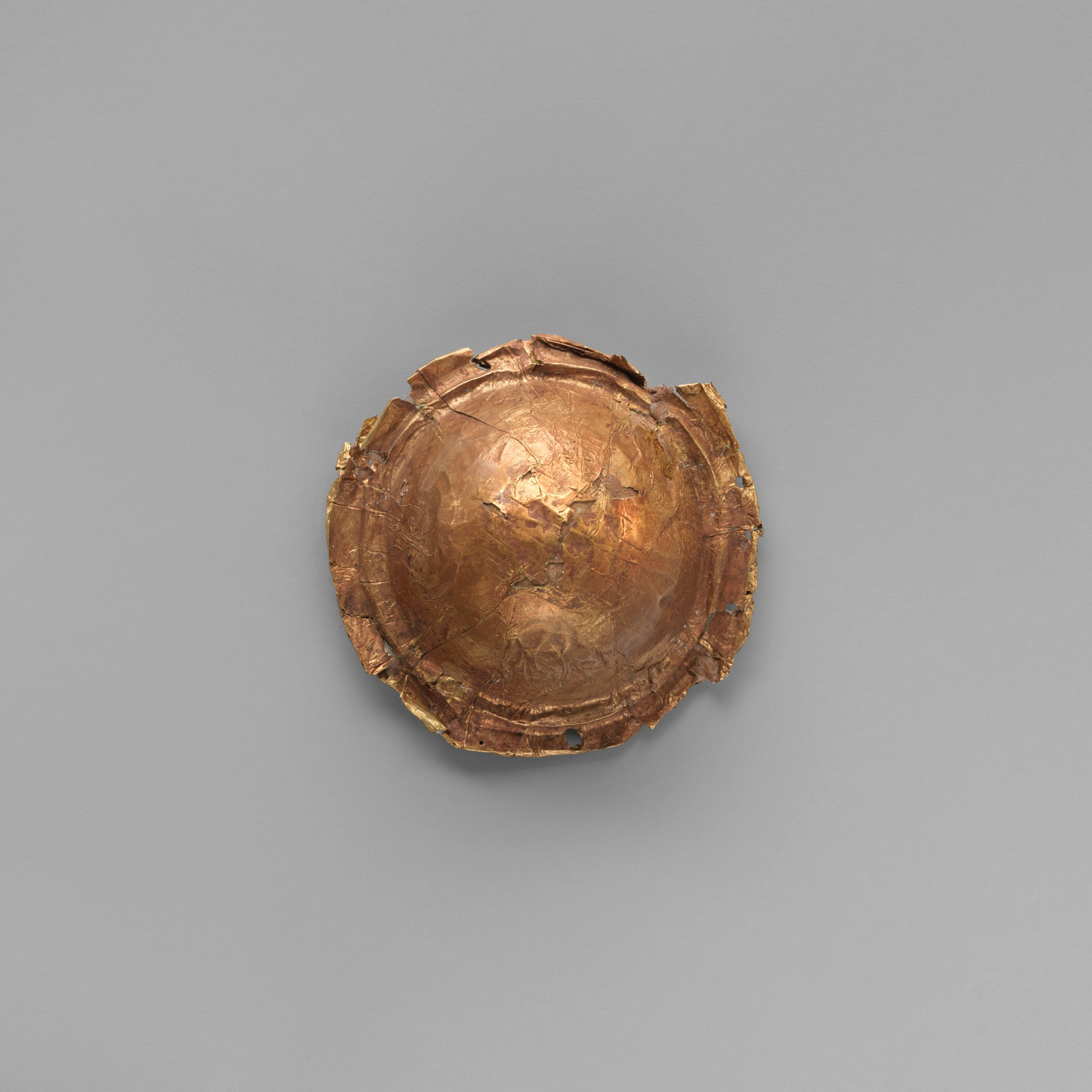 Gold roundel of bulbous form — Unknown