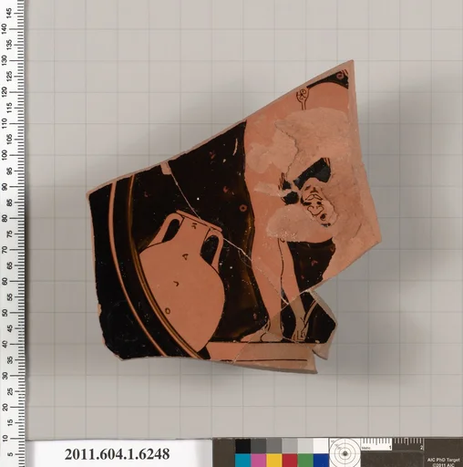 Terracotta fragment of a kylix (drinking cup)