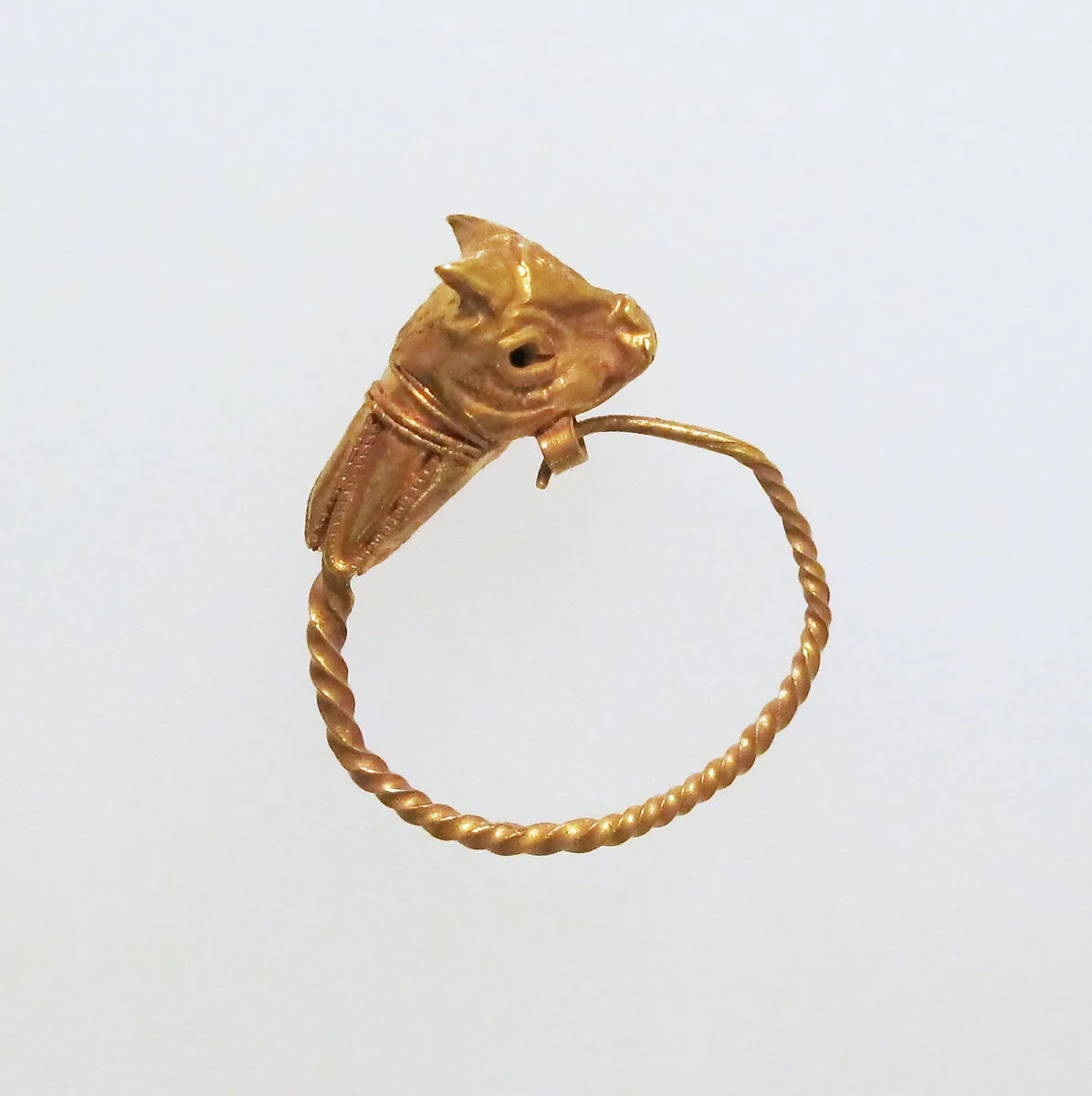 Gold earring with head of a bull — Unknown