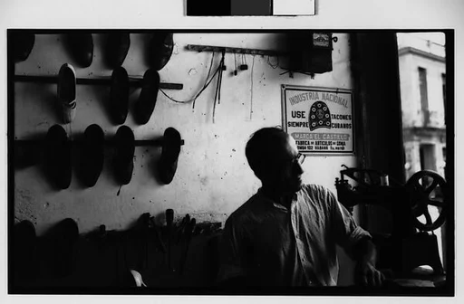 [Cobbler Working in Shop, Havana]