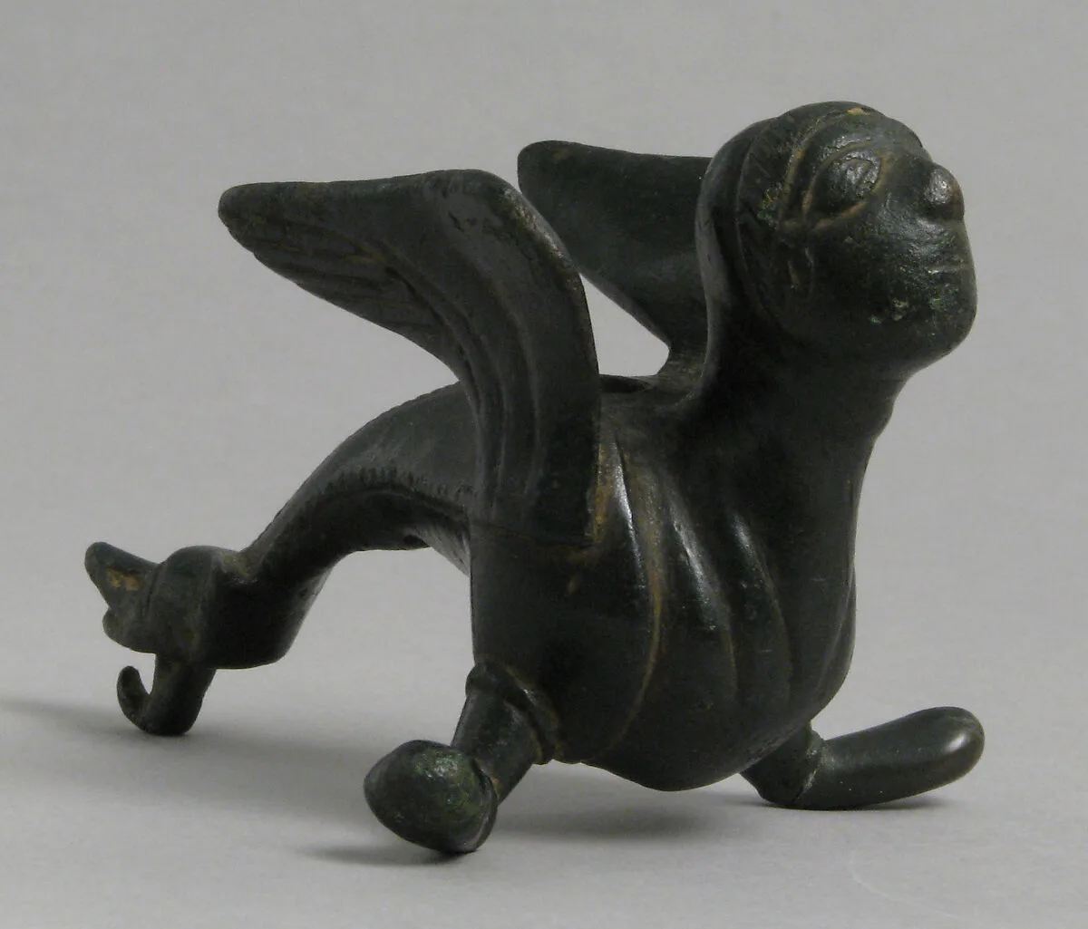 Fabulous Winged Creature with Human Face, probably from the foot of a candlestick — Unknown