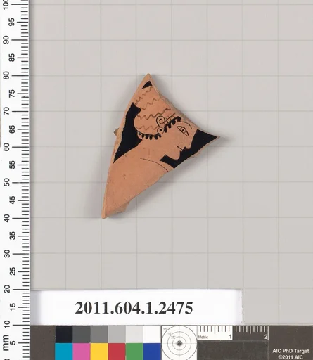 Terracotta fragment of a kylix (drinking cup)
