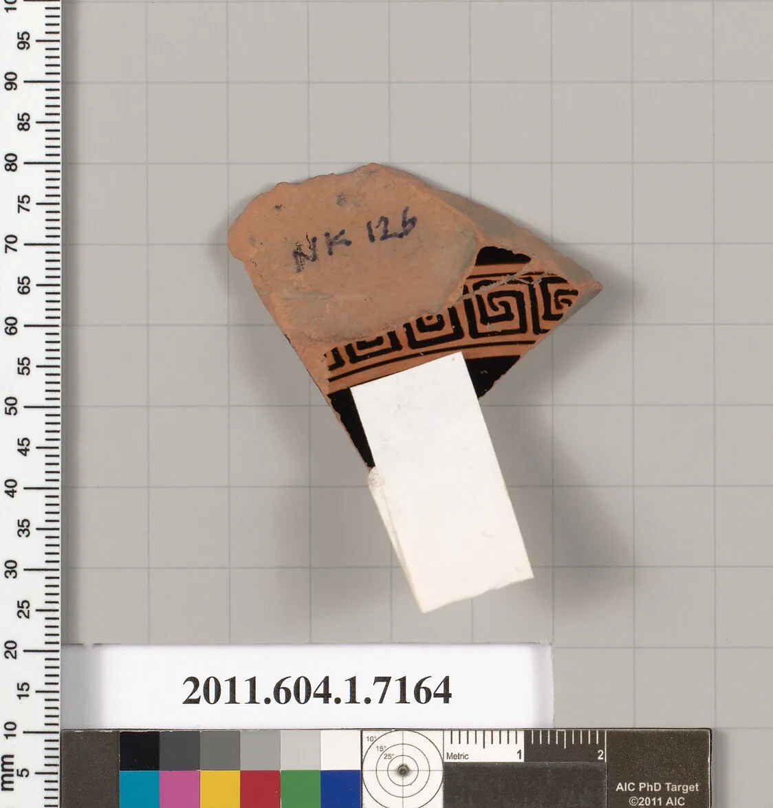 Terracotta fragment of a kylix (drinking cup) — Makron