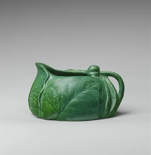 Cream pitcher with water lilies