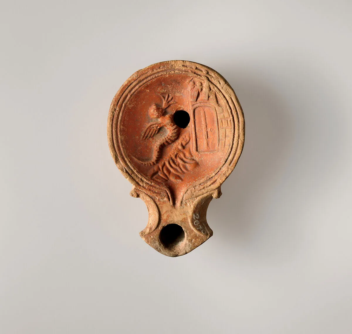 Terracotta oil lamp — Unknown