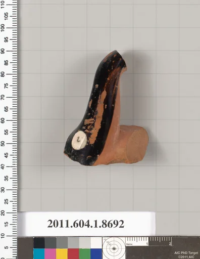 Terracotta fragment of a stemless kylix (drinking cup)